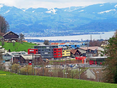 View of a suburban residential area in Wollerau on a hill above Lake Zurich - Canton of ZÃ¼rich...