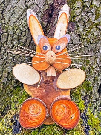 Picturesque Easter bunny made of wood and natural materials in a suitable environment - Canton of...