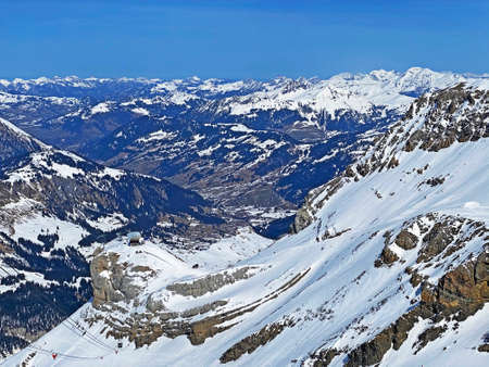 Spring icy alpine atmosphere on the Swiss mountain peaks viewed from the Les Diablerets massif...