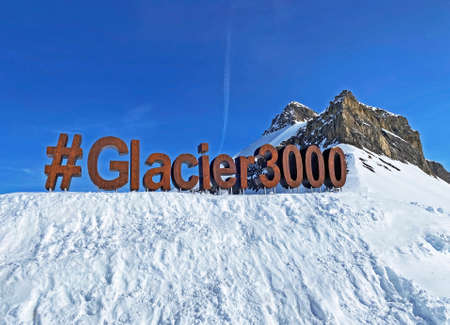 Photoshoot point with the hashtag and the name of the tourist destination Glacier 3000 in the area of Glacier du Sex Rouge, Les Diablerets - Canton of Vaud, Switzerland / Suisseのeditorial素材