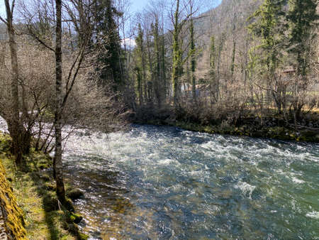 The course of the river Orbe between the cave or spring and the settlement of Vallorbe (der Fluss Orbe or le fleuve de l'Orbe), Vallorbe - Canton of Vaud, Switzerland (Kanton Waadt, Schweiz)の写真素材