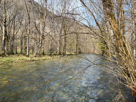 The course of the river Orbe between the cave or spring and the settlement of Vallorbe (der Fluss Orbe or le fleuve de l'Orbe), Vallorbe - Canton of Vaud, Switzerland (Kanton Waadt, Schweiz)の写真素材