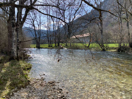 The course of the river Orbe between the cave or spring and the settlement of Vallorbe (der Fluss Orbe or le fleuve de l'Orbe), Vallorbe - Canton of Vaud, Switzerland (Kanton Waadt, Schweiz)の写真素材