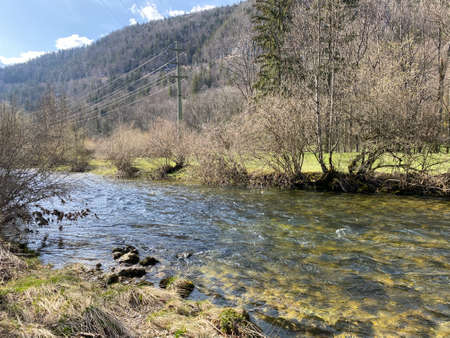 The course of the river Orbe between the cave or spring and the settlement of Vallorbe (der Fluss Orbe or le fleuve de l'Orbe), Vallorbe - Canton of Vaud, Switzerland (Kanton Waadt, Schweiz)の写真素材