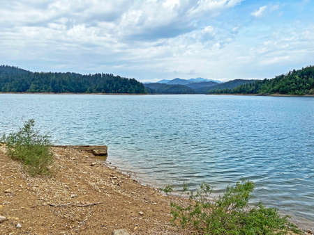Artificial reservoir Lake Lokve or Artificial accumulation Lokvarsko Lake - Gorski kotar, Croatia (Lokvarsko jezero ili umjetno akumulacijsko Omladinsko jezero, Lokve - Gorski kotar, Hrvatska)の写真素材