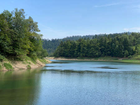 Artificial reservoir Lake Lokve or Artificial accumulation Lokvarsko Lake - Gorski kotar, Croatia (Lokvarsko jezero ili umjetno akumulacijsko Omladinsko jezero, Lokve - Gorski kotar, Hrvatska)の写真素材