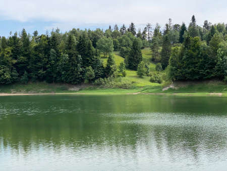 Artificial reservoir Lake Lokve or Artificial accumulation Lokvarsko Lake - Gorski kotar, Croatia (Lokvarsko jezero ili umjetno akumulacijsko Omladinsko jezero, Lokve - Gorski kotar, Hrvatska)の写真素材