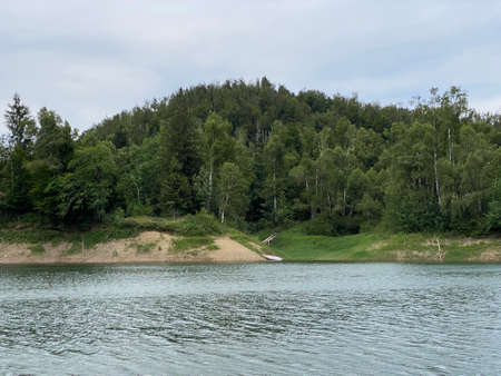 Artificial reservoir Lake Lokve or Artificial accumulation Lokvarsko Lake - Gorski kotar, Croatia (Lokvarsko jezero ili umjetno akumulacijsko Omladinsko jezero, Lokve - Gorski kotar, Hrvatska)の写真素材