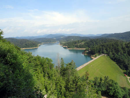 Artificial reservoir Lake Lokve or Artificial accumulation Lokvarsko Lake - Gorski kotar, Croatia (Lokvarsko jezero ili umjetno akumulacijsko Omladinsko jezero, Lokve - Gorski kotar, Hrvatska)の写真素材