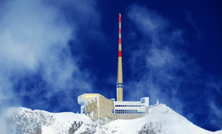 Hotel SÃ¤ntis (Saentis) or Hotel Santis and SÃ¤ntisgipfel Panorama Restaurant (Saentisgipfel Panorama Restaurant) - an impressive view of the summit in a fairytale winter setting, Switzerland (Schweiz)の写真素材
