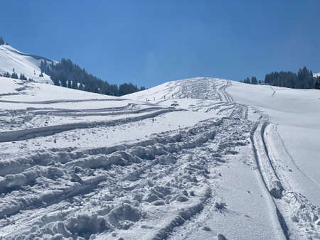 Wonderful winter hiking trails and traces on the slopes of the Alpstein mountain range and in the...