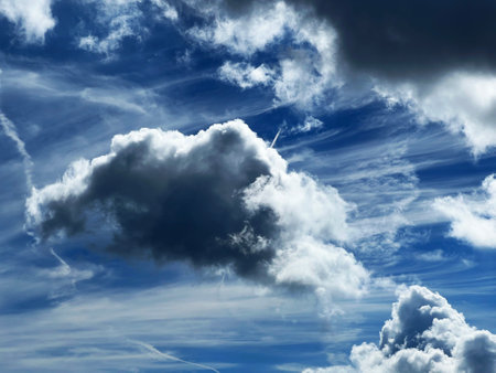Picturesque and beautiful clouds over the Swiss mountain peaks in the Silvretta Alps and Albula Alps...