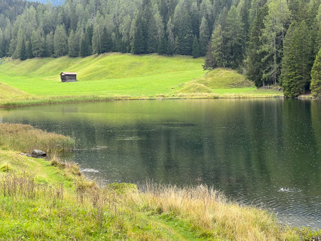 Alpine mountain lake Schwarzsee or Black Lake between the tourist towns of Davos and Klosters - Canton of Grisons, Switzerland (Kanton GraubÃ¼nden, Schweiz)の写真素材