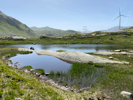 Summer atmosphere on the Lago di San Carlo lake (Lake San Carlo) in the Swiss alpine area of the mountain St. Gotthard Pass (Gotthardpass), Airolo - Canton of Ticino (Tessin)の写真素材