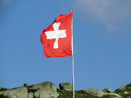 National flag of the Swiss Confederation (Flag of Switzerland - National Flag of Switzerland)- Nationalflagge der Schweizerischen Eidgenossenschaft (Offizielle Flagge der Schweizの写真素材