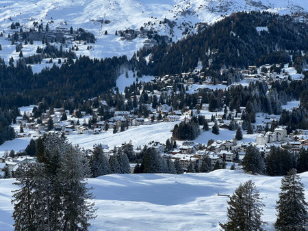 A fairytale winter atmosphere and a magnificent panorama on the mountine tourist resorts of Valbella and Lenzerheide in the Swiss Alps - Canton of Grisons, Switzerland (Schweiz)の写真素材