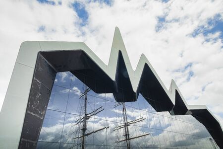 waterfront side of the RIVERSIDE MUSEUM WITH LIFEBELTS IN THE FOREGROUNDのeditorial素材