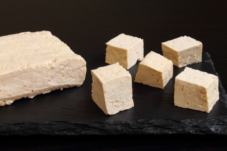 Fresh tofu cut into cubesの写真素材