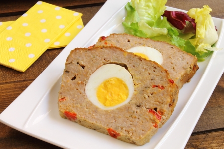 Meatloaf with boiled egg and red pepperの写真素材