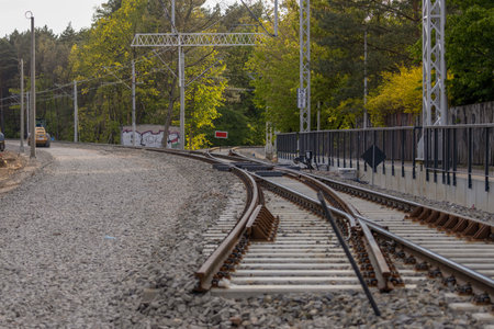 Sustainable electric transportation. Electric passenger train. Expansion of railway infrastructure in the European Union. metal industry. Ironworks. Steel.の写真素材