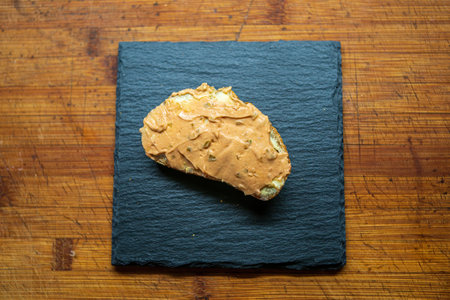 a delicious fresh bread with herb cream for the breakfast