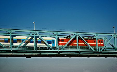 Train running over Danubian bridgeの写真素材