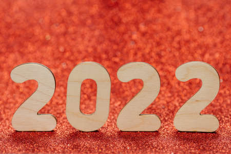 The number 2022 on a shiny red background top viewの写真素材