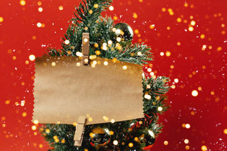 Christmas layout ecological craft packaging on a red background top view.の写真素材