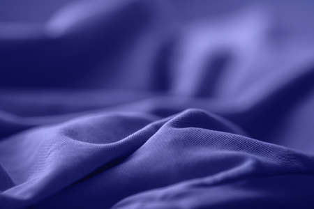 Smooth elegant violet silk or satin can use as backgroundの写真素材