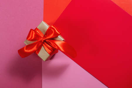 Gifts in kraft paper with red ribbon.の写真素材
