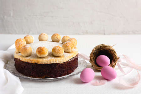 Easter cake fragrant simnel on the table on a gray background for breakfast.