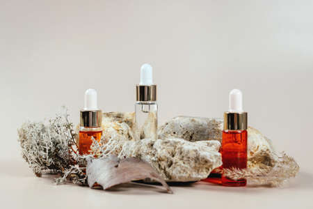 Podium for goods and cosmetics from natural materials on a beige background and cotton.の写真素材