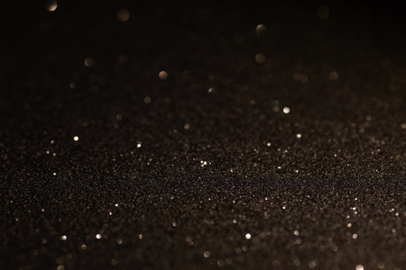 Black glittering background for design and free space and place for text.の写真素材