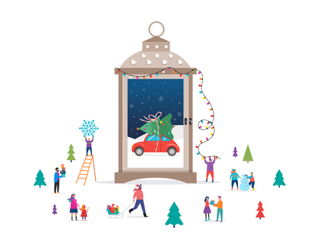 Merry Christmas, Winter wonderland scene in a snow globe, candle lantern, and small people, young men and women, families having fun in snowの写真素材