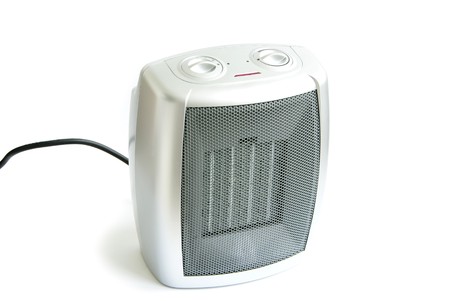 Small portable electric heater isolated on white backgroundの写真素材