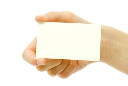 card blanks in a hand on white backgroundの写真素材