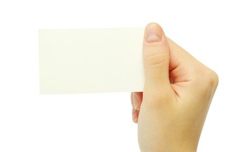 card blanks in a hand on white backgroundの写真素材