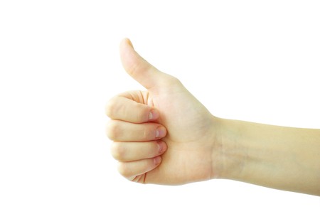 Human hand showing thumbs up isolated on whiteの写真素材