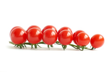 cherry tomatoes isolated on a  white backgroundの写真素材