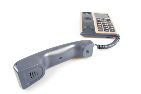 blue office telephone isolated on a white backgroundの写真素材