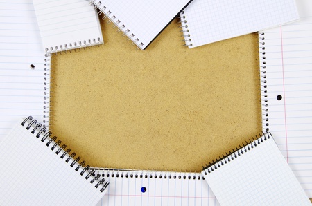notebooks on a woods background