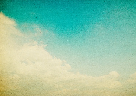 grunge image of blue sky with cloudsの写真素材