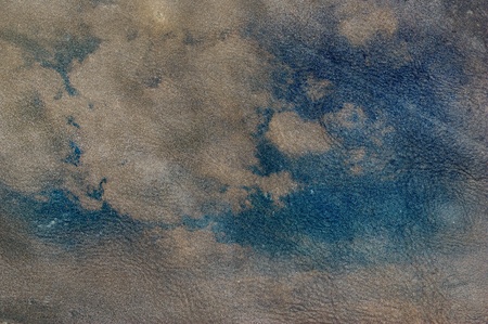 grunge image of blue sky with cloudsの写真素材