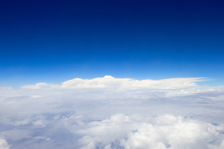 Blue sky with clouds backgroundの写真素材