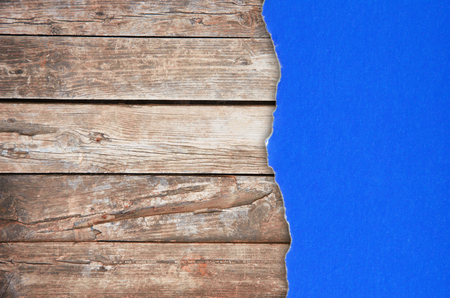 Grunge paper on wooden wallの写真素材