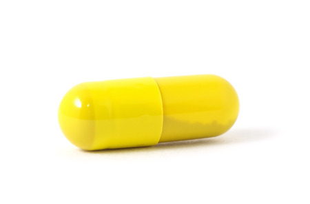 pills capsules isolated on white backgroundの写真素材