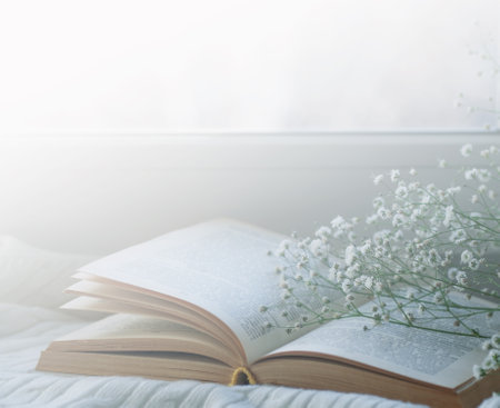 Cozy winter still life opened book. blurredの写真素材