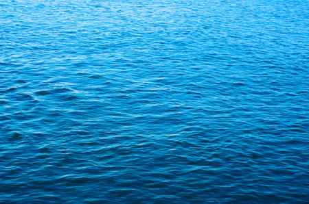 Blue sea water background textureの写真素材