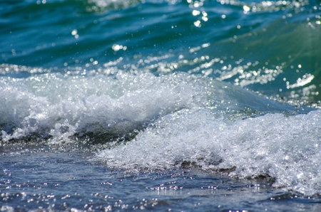 Soft wave of sea on sandy beach. background.