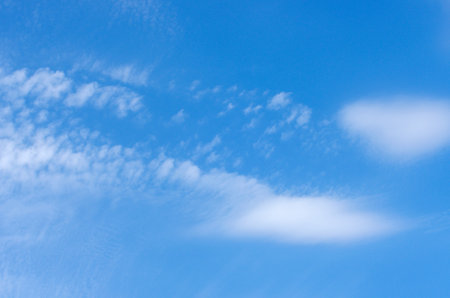 white clouds in blue skyの写真素材